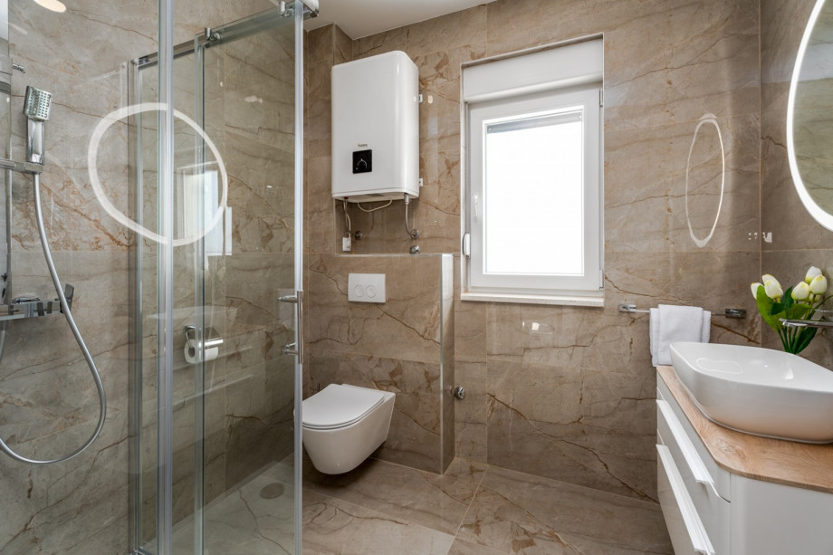 Family bathroom with a shower