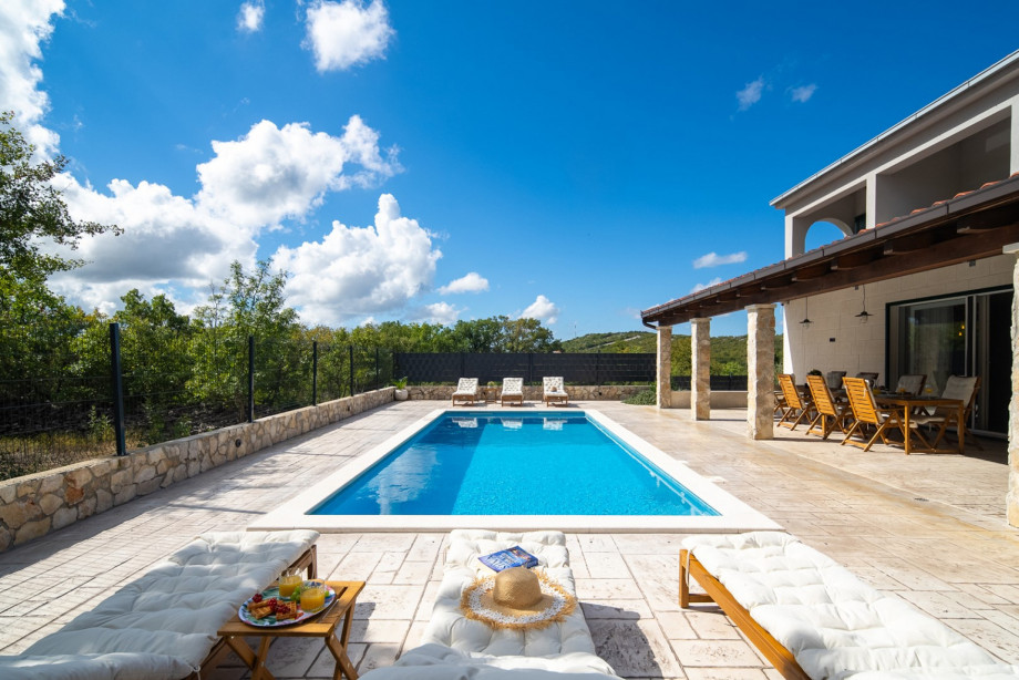 Escape to the serene village of Blizna Gornja, nestled in the Trogir hinterland, and discover Villa Admiral