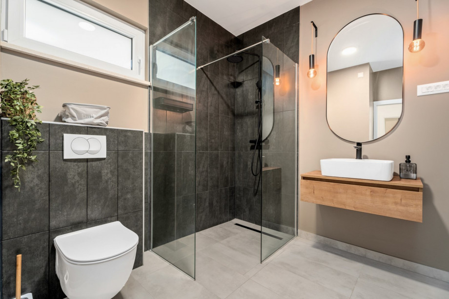 Family bathroom with a shower, on the ground floor.