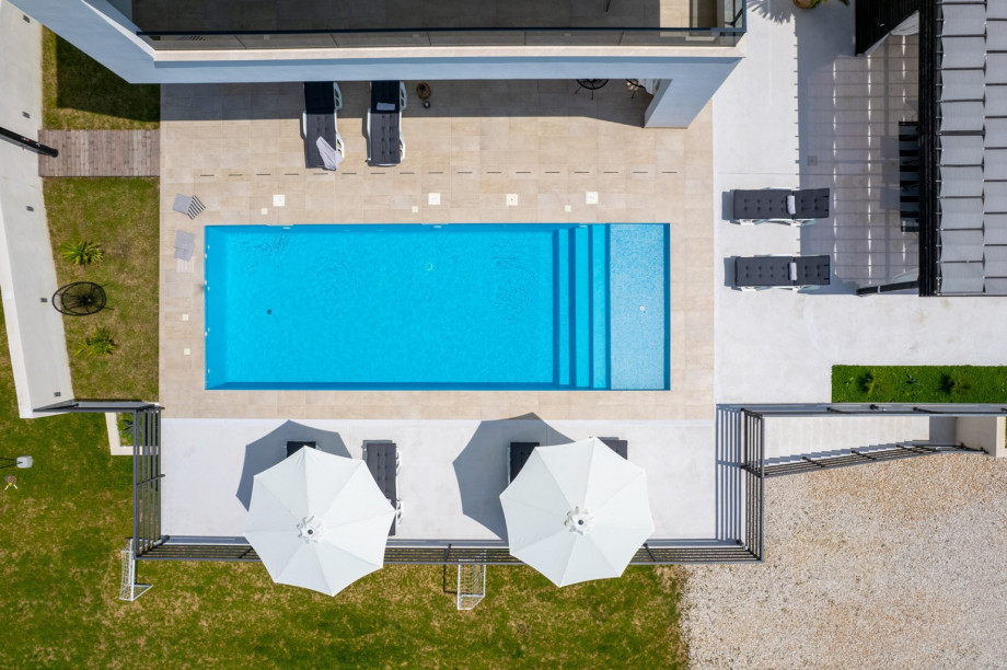 Villa itself offers 234 sqm of very nicely organized interior positioned on a 960 sqm fenced plot.