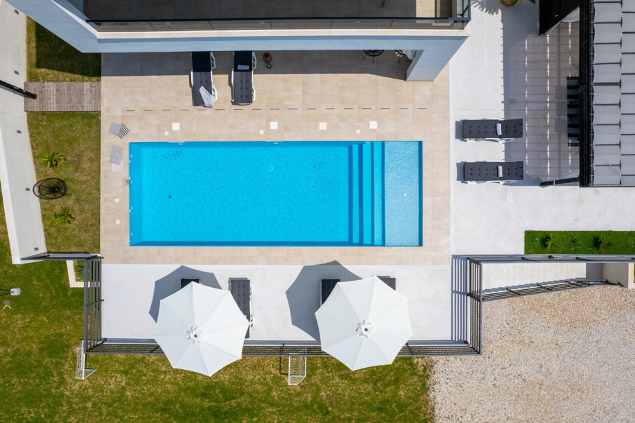 Villa itself offers 234 sqm of very nicely organized interior positioned on a 960 sqm fenced plot.