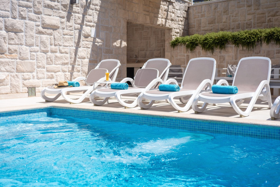 The villa’s expansive sun deck is perfect for soaking up the sun