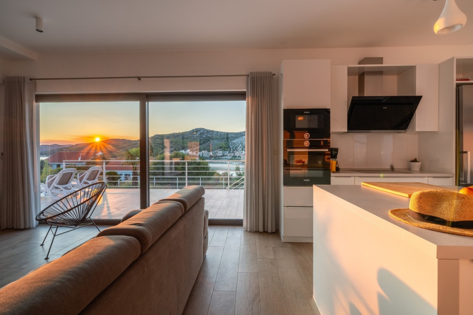 Enjoy watching the sunrise or sunset from the living room which is unforgettable