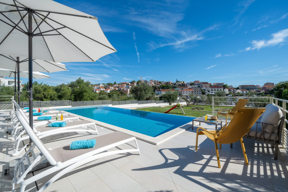 A very spacious sun deck area that offers privacy for your absolute relaxation with 7 deck chairs