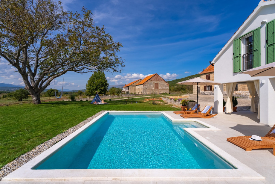 Surrounded by a spacious sun deck, guests will find six inviting deck chairs