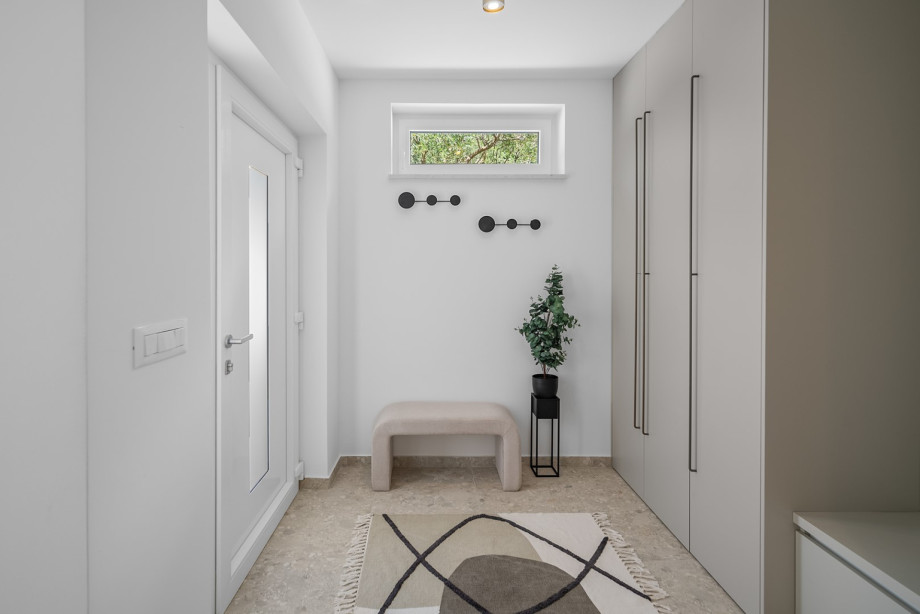 This exquisite villa comprises three elegant bedrooms, each designed for ultimate comfort and privacy