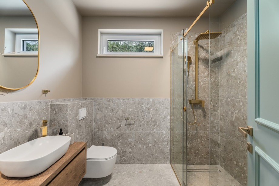 Completing the villa's amenities is a well-appointed family bathroom