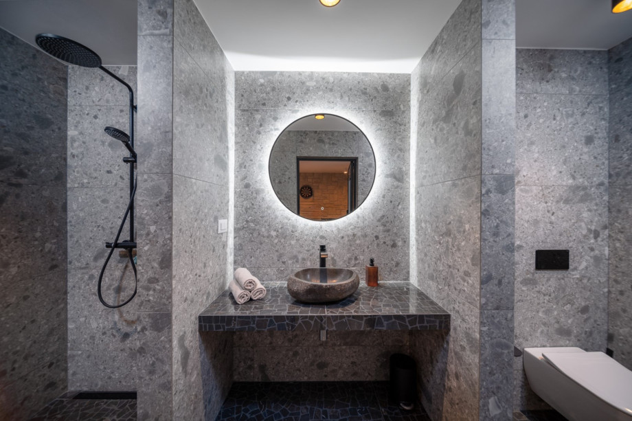 A family bathroom with a shower