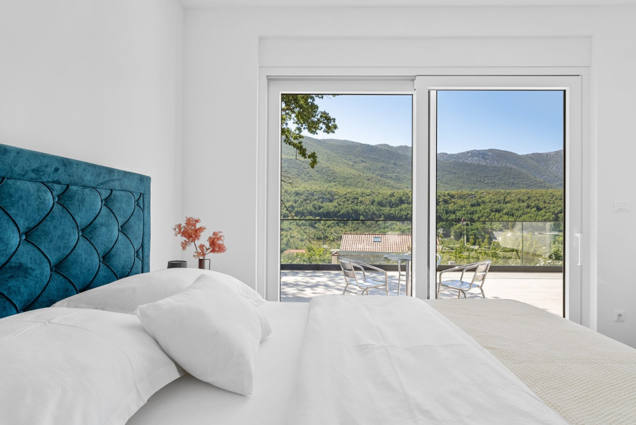 Bedroom No. 1  has a 180cm x 200cm king-size bed, air conditioning, en-suite shower bathroom, and a terrace.