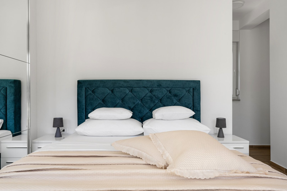 Bedroom No. 2 features a 160cm x 200cm queen-size bed, air conditioning, en-suite shower bathroom, a shared terrace