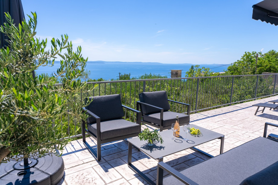Outdoor sitting area with a sea view