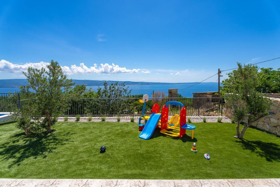A playground next to the pool is the best fun for the kids