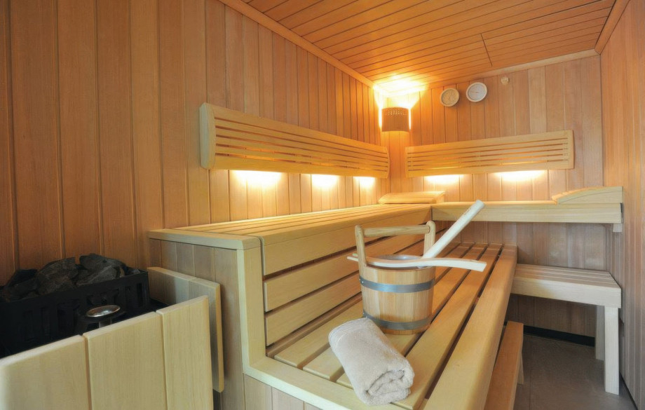 Guests can enjoy a classic thermal experience in the Finnish sauna, which is part of the villa's private spa zone.
