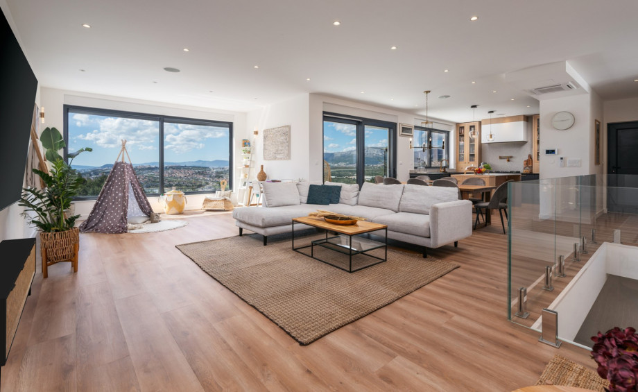 Living area with reading corner and a children corner with some toys and fun zone