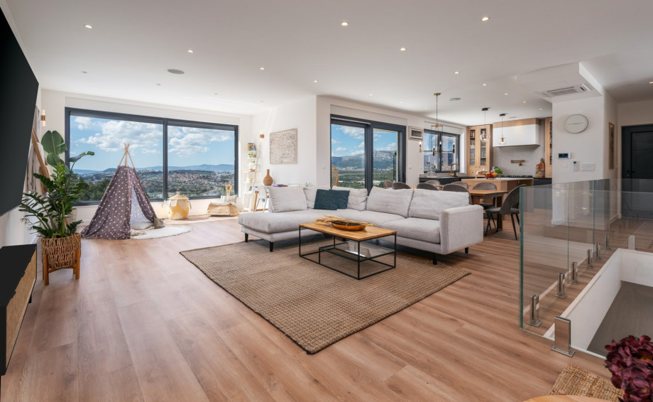 Living area with reading corner and a children corner with some toys and fun zone