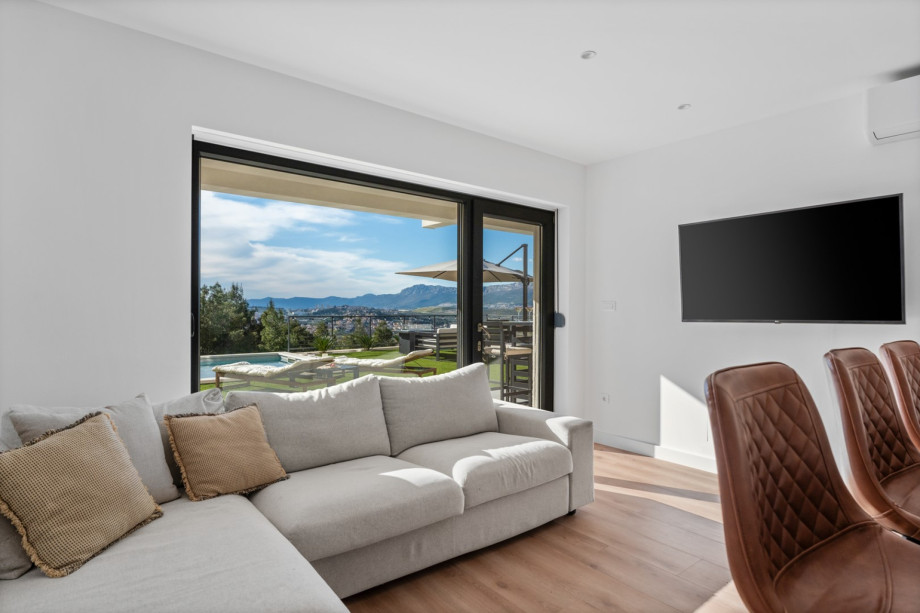 Ground floor (pool level) with direct approach to the pool area and outdoor dining area