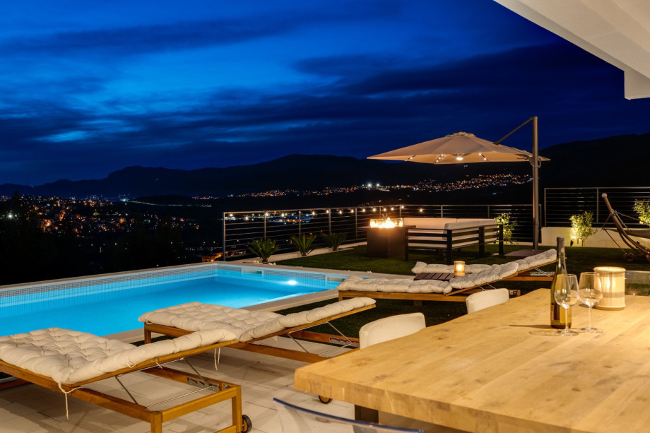 Night view of the villa and outside area