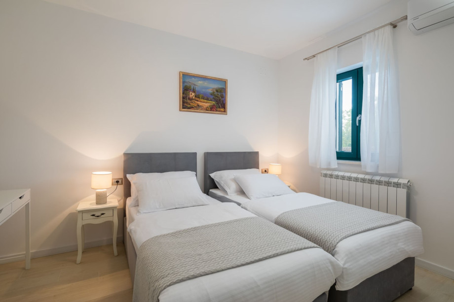 Bedroom NO6 with two single beds 90cm x 200cm, that can connect into a king size bed, A/C