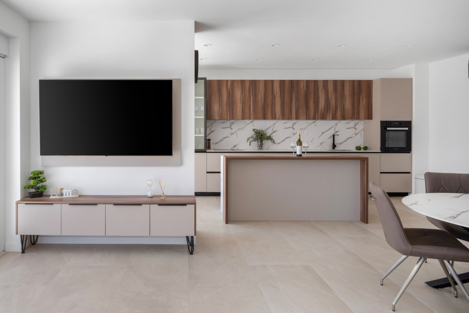 Living room, dining area, and kitchen are all connected by an open-plan layout