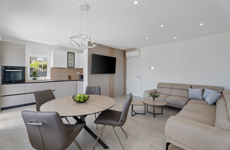 Open concept living area and a balcony with sea views