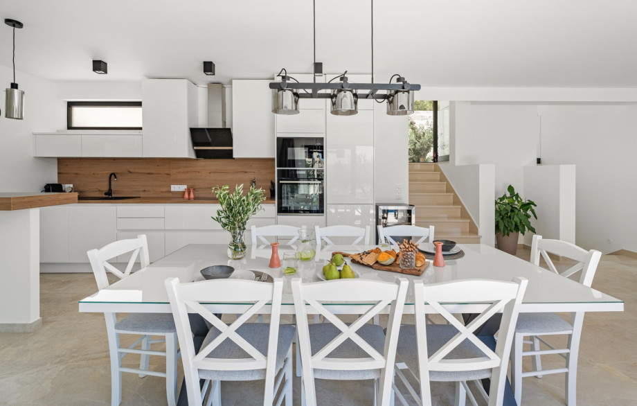 Spacious dining area for 8 pax filled with natural light
