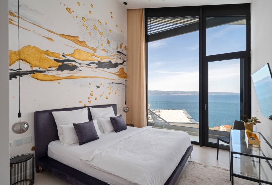 Bedroom NO2 with king-size bed, A/C, TV, balcony with views of the pool and sea