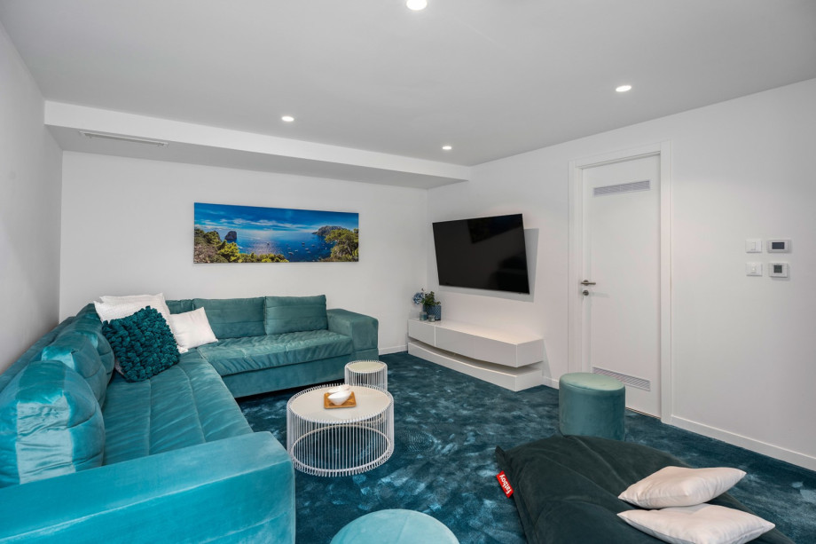 Cozy media room with a Play Station 5