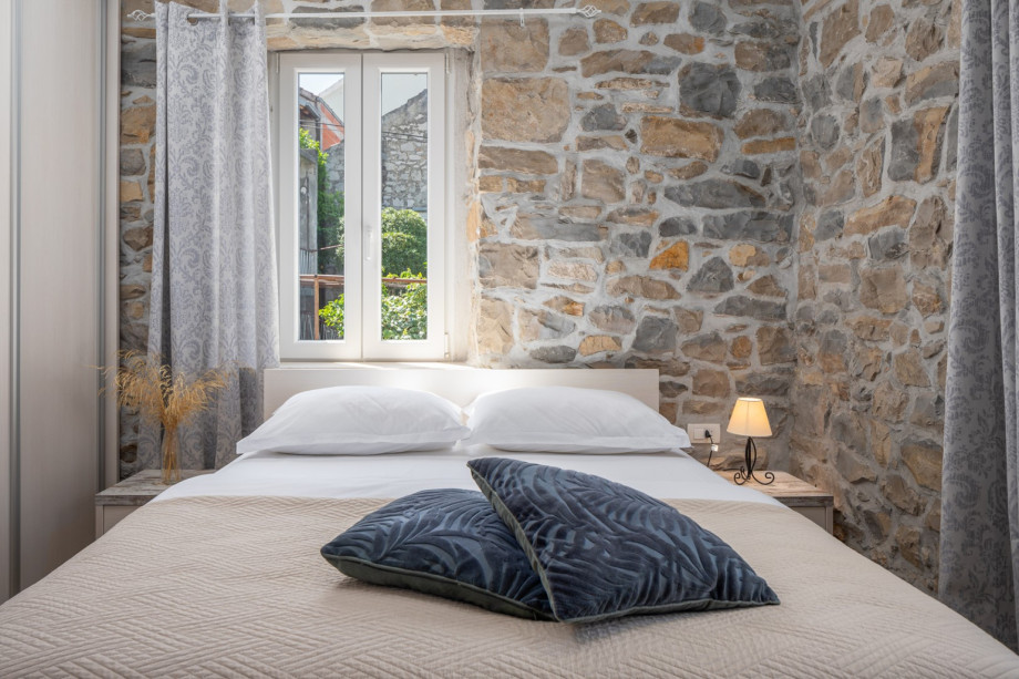 Bedroom NO1 with a double bed 160cm x 200cm, air conditioning, TV