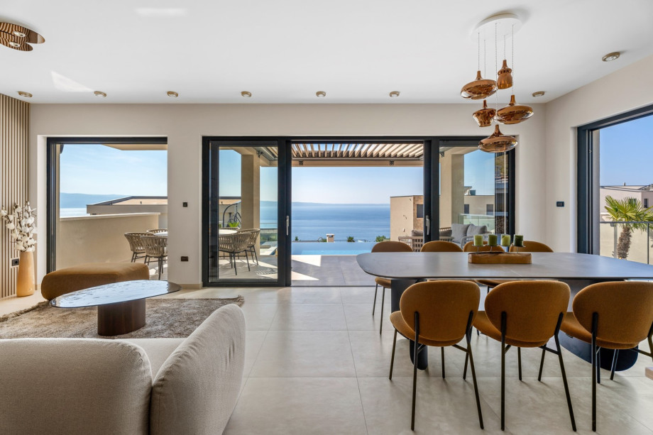 The living area (53sqm) offers a stylish living/dining area