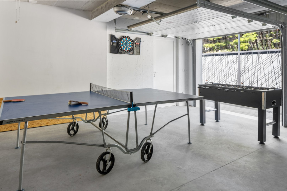 Garage with table tennis, football table, darts, etc.