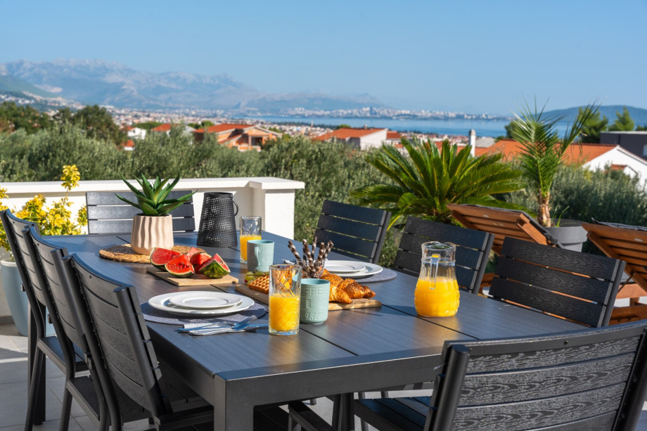Outdoor dining area with amazing views of the surroundings and the sea