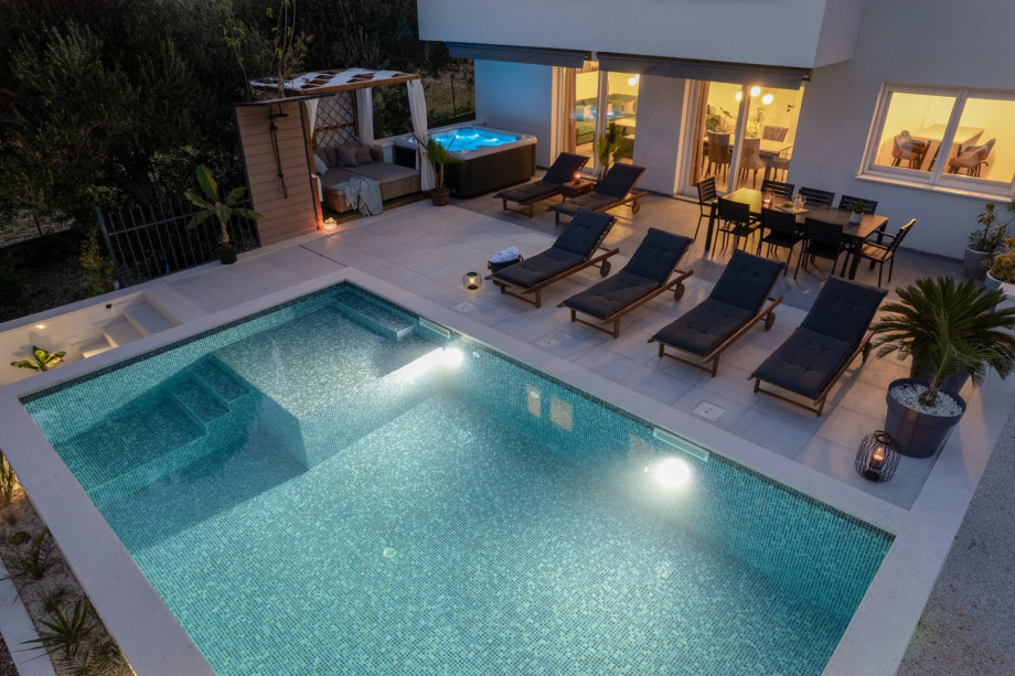 Enjoy evenings at pool area with carefully selected lights around