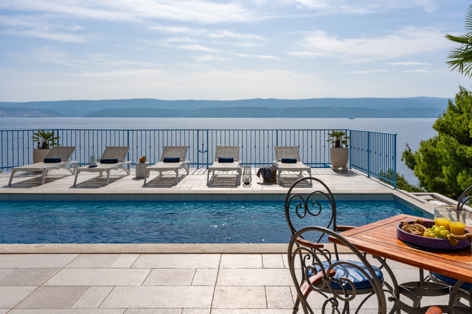 View from the entrance of the house to the pool and sea view
