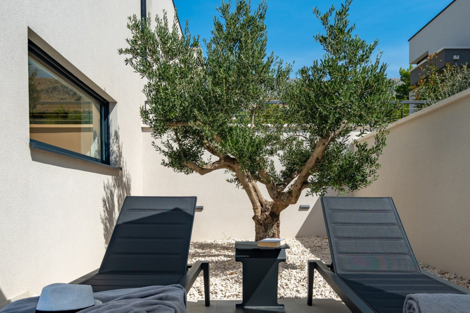 Private and relaxing sun deck by the pool