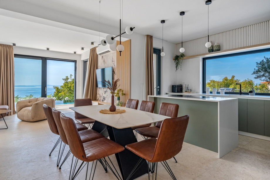 Direct exit to the outdoor dining area and pool