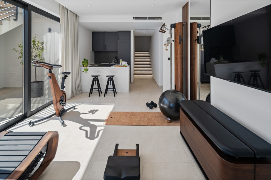 The gym is equipped with state-of-the-art NOHrD equipment that combines high-quality workmanship, natural materials, and elegant design.