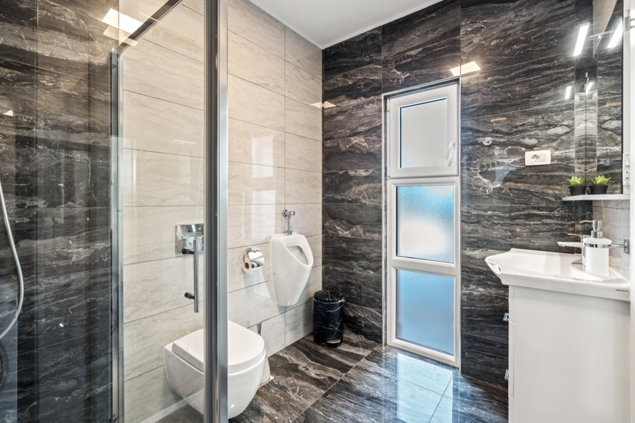 Family Bathroom No1 with a shower