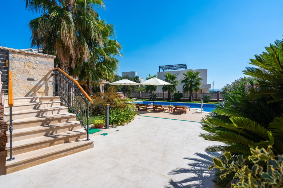 a private, heated 10m x 5m pool with massage system, 6 deck chairs and 2 parasols