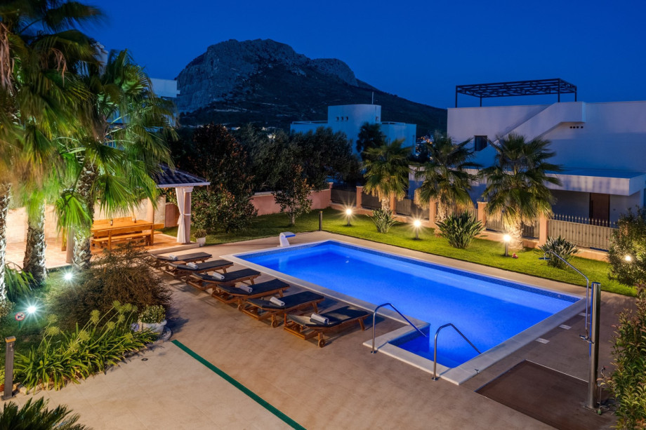 a private, heated 10m x 5m pool with massage system, 6 deck chairs and 2 parasols