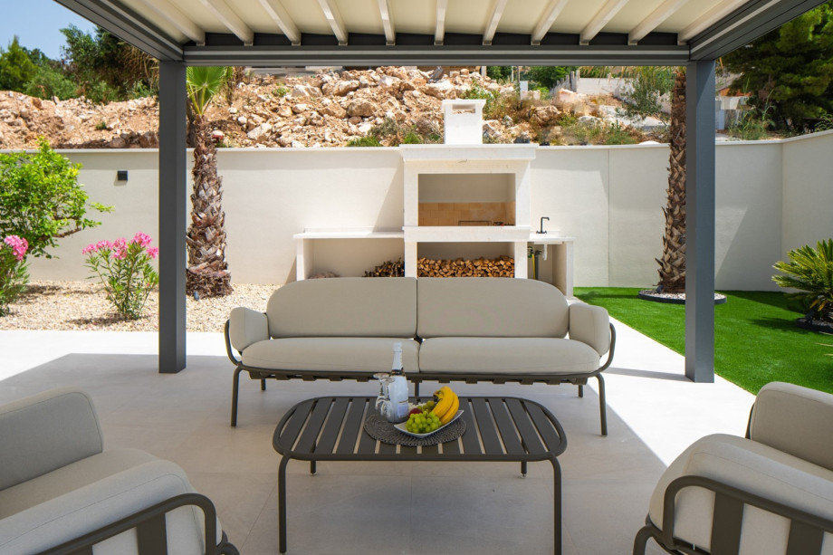 Covered lounge area, perfect for morning coffee