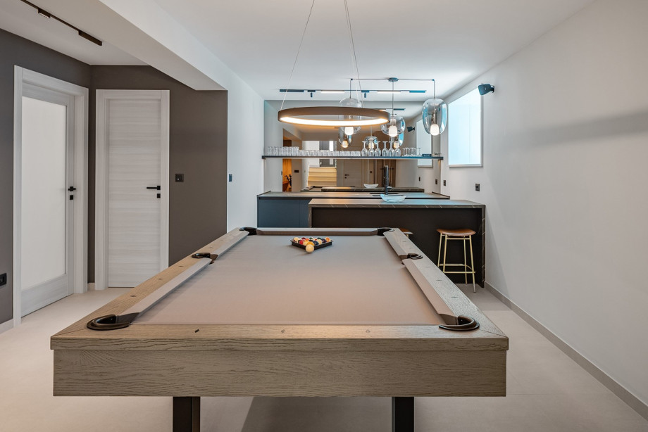 Fun zone with billiard pool and kitchenette