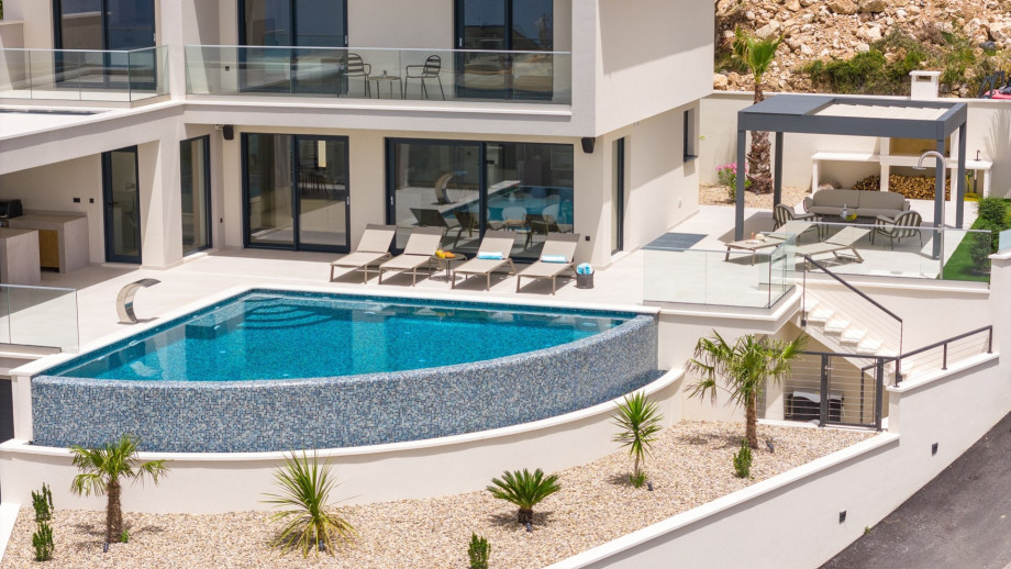 This exquisitely furnished home exudes style with its chic modern architecture