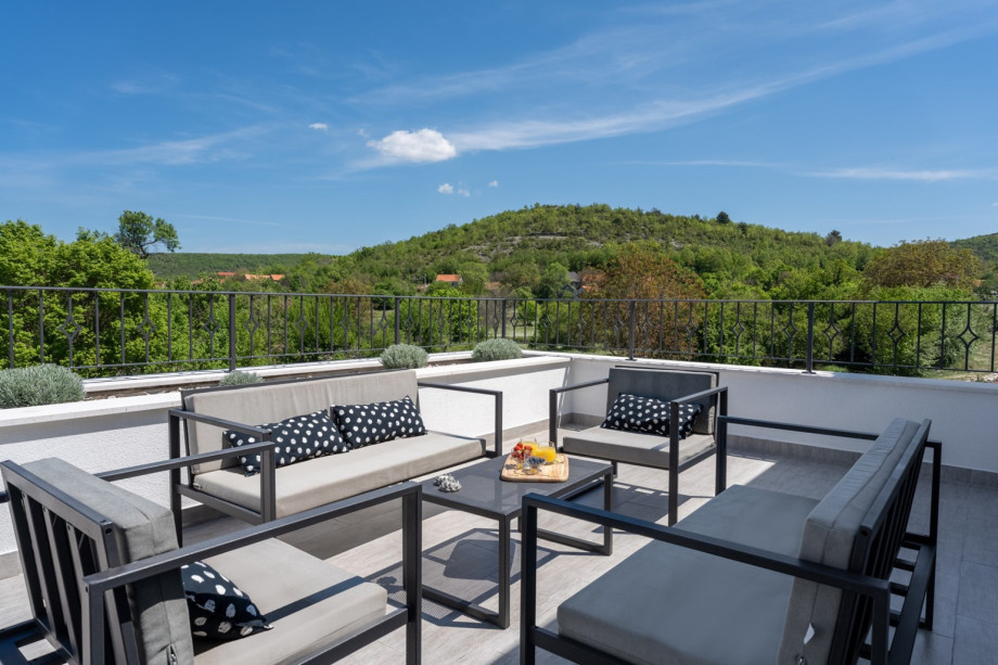 large 2x terrace on the first floor with great panoramic views of nature