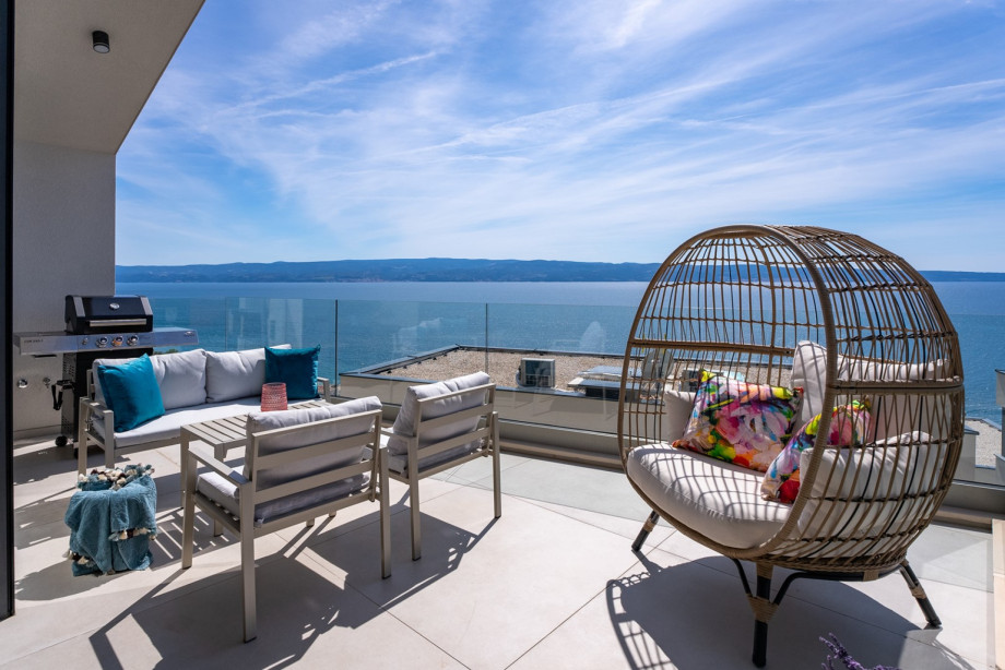 Terrace with a lounge area and BBQ