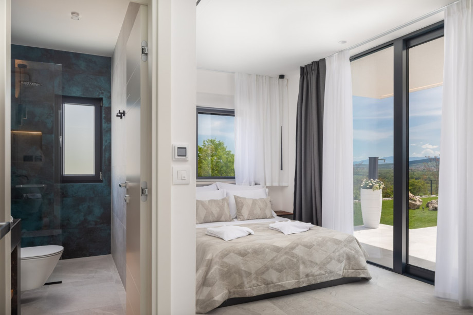 Bedroom No4 (13.5sqm) queen size bed 160cm x 200cm, en-suite bathroom (3.7sqm) with a shower, and direct approach to the pool area