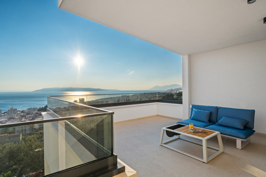 Bedroom No.2 has a loggia with seating place to enjoy a sunset.