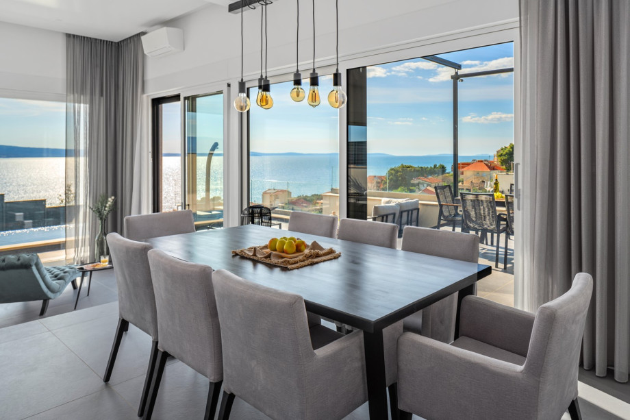 Spacious dining area for 8 pax filled with natural light