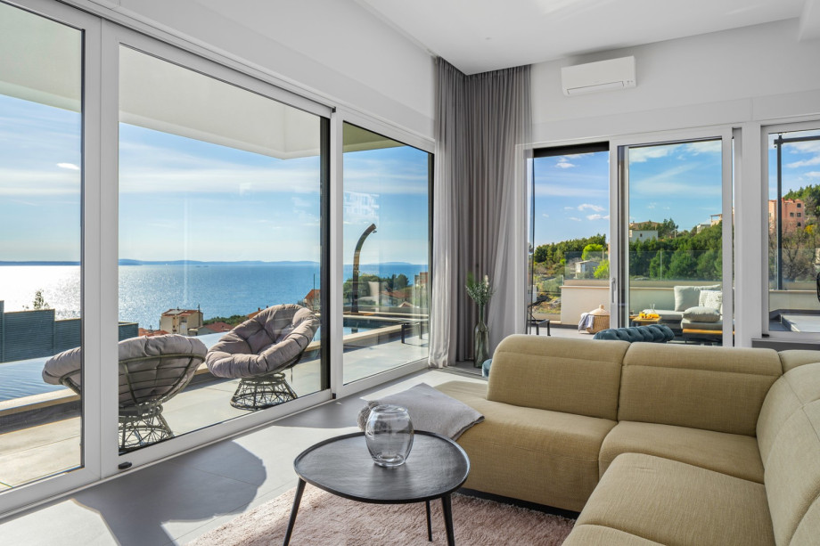 Beautifully designed with so many glass doors and windows offering nice sea views