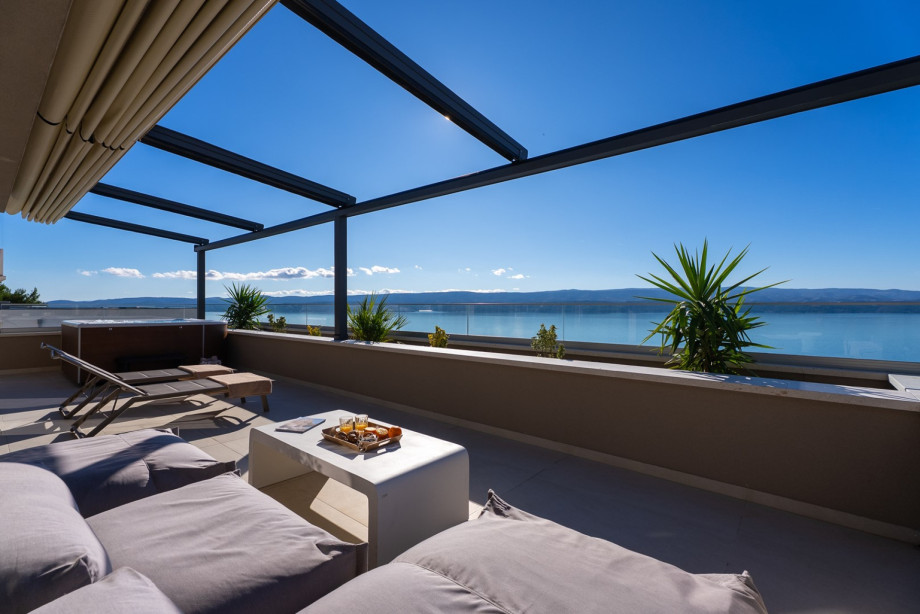 A comfortable lounge corner and the hot tub (whirlpool) are situated on the top terrace, which is the private terrace found off the master bedroom, No.1.