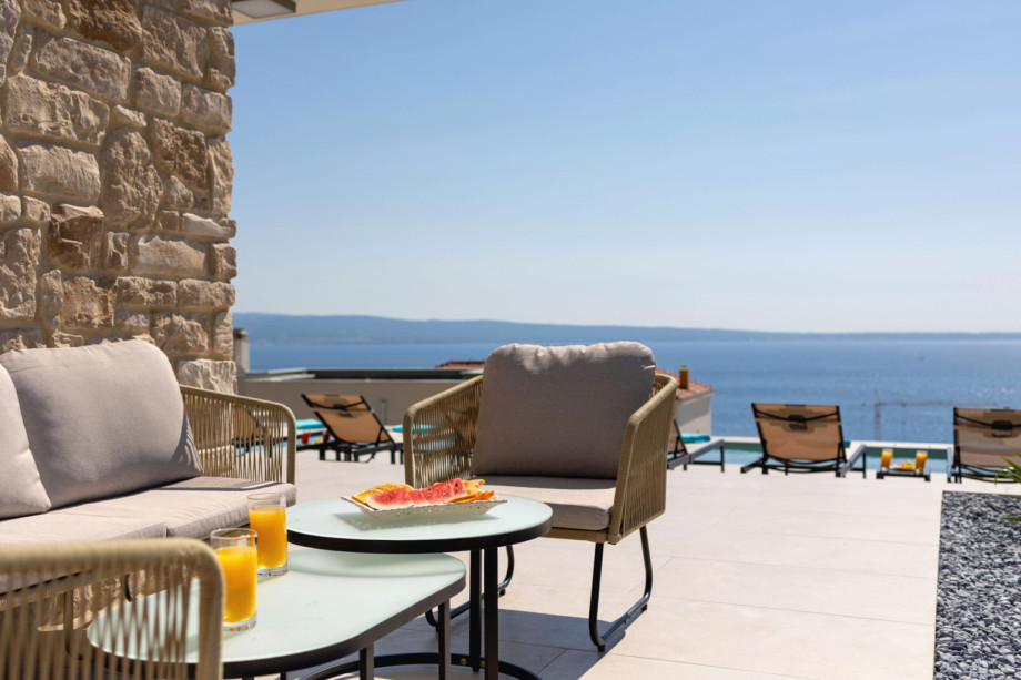 The lounge corner on the sun deck is a perfect spot to unwind and watch the sunset.